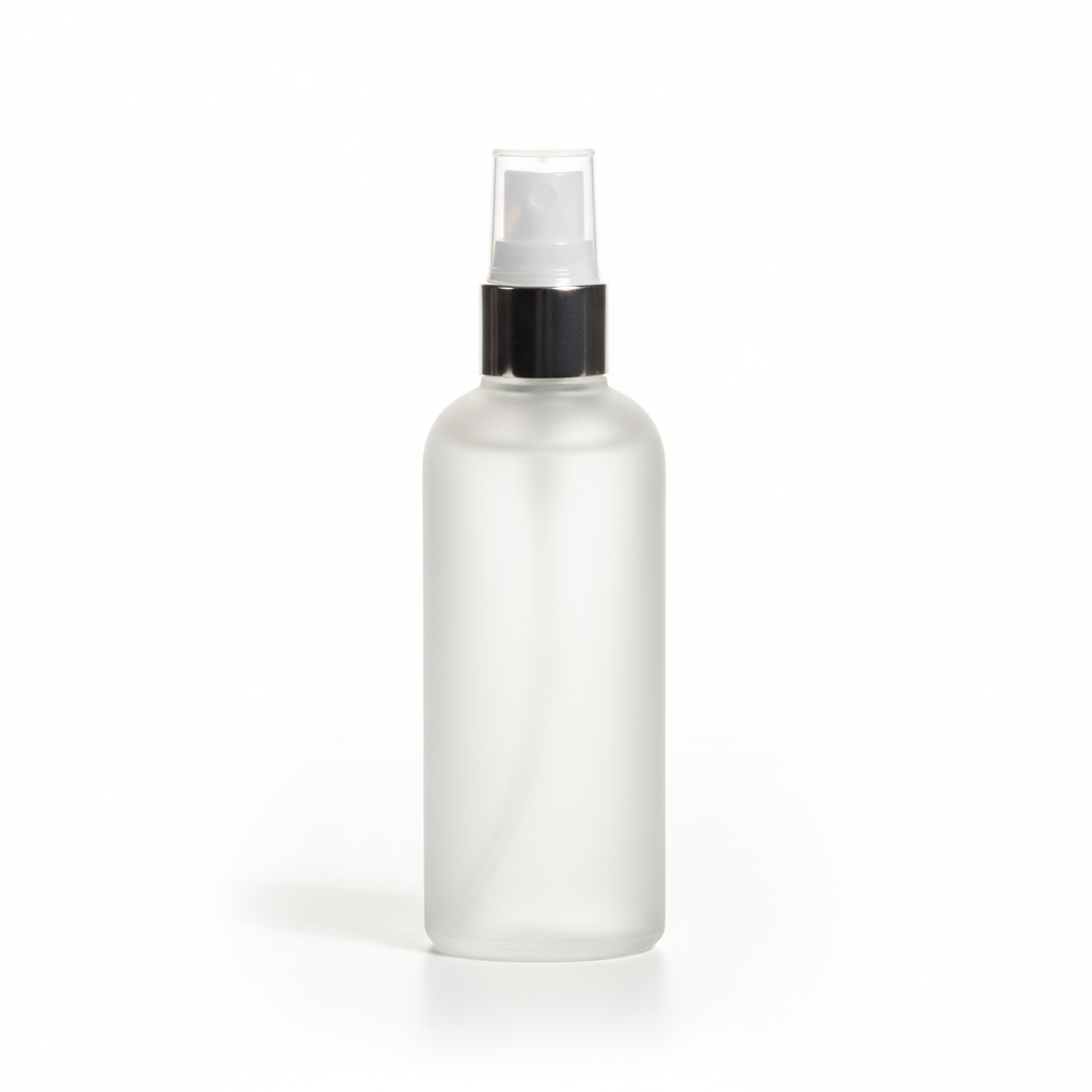 Clear spray bottle with black nozzle on a white background